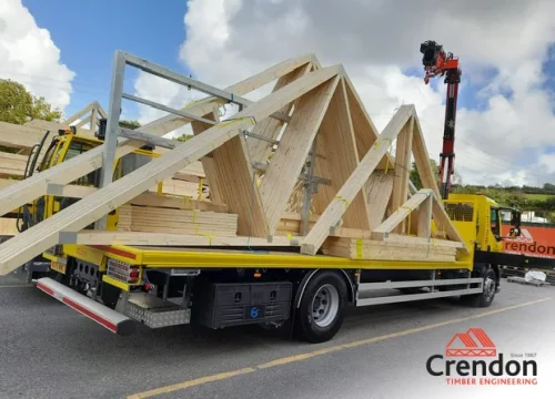 Roof trusses on back on flat bed lorry